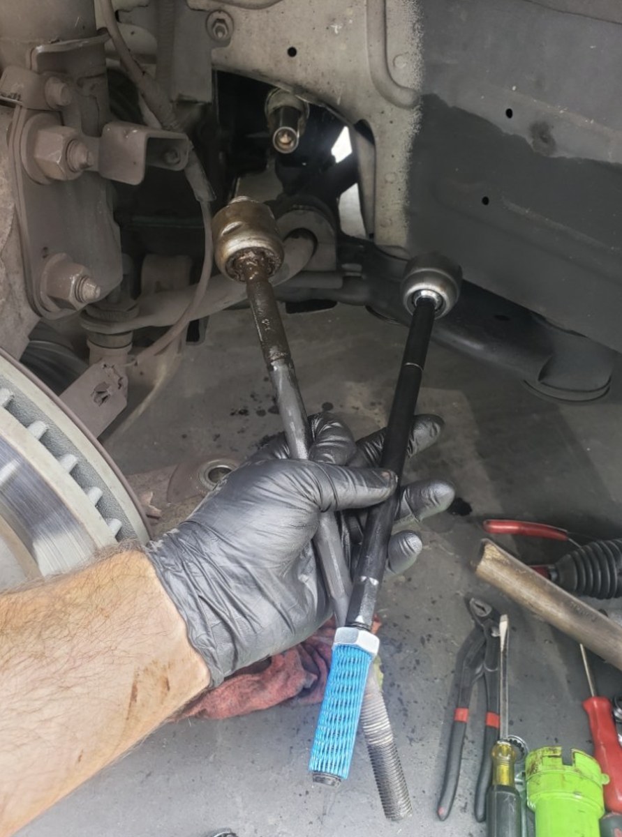 Worn part held next to its replacement for a Westminster customer to see